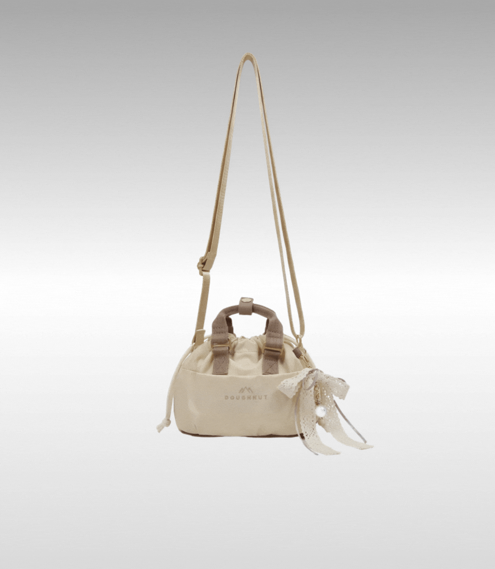 Kleine Doughnut Gossamer Tasche in Creme mit Schleife